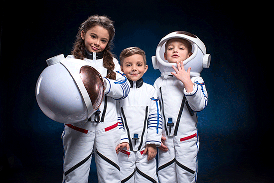 two boys and girl in space suits